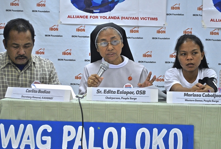 Benedictine Sr. Edita Eslopor at a press conference in Quezon City explained that her group of Haiyan survivors called People Surge was protesting the slow distribution of relief goods that was leading to spoiled goods and wasted money. (N.J. Viehland)