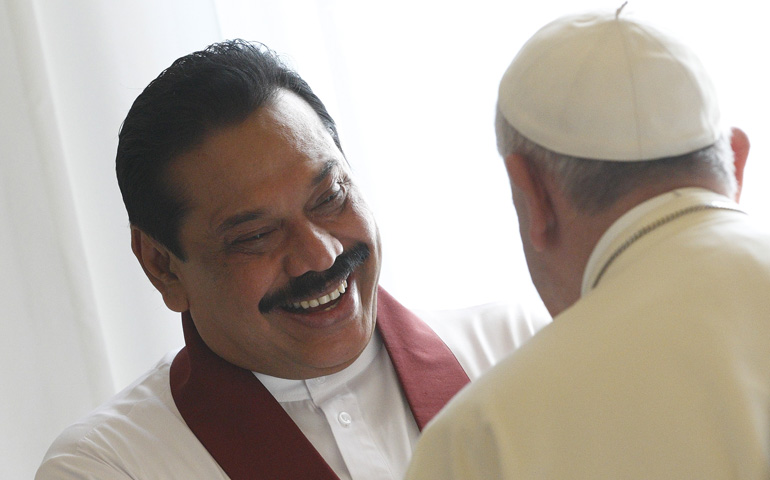 Pope Francis meets Sri Lankan President Mahinda Rajapaksa during a private audience Oct. 3 in the Apostolic Palace at the Vatican. (CNS/Paul Haring)