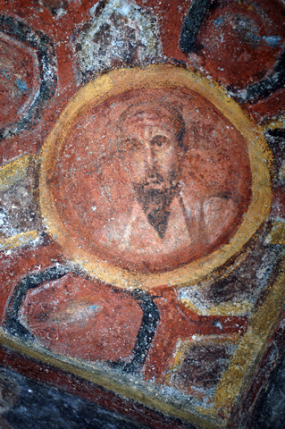 A fourth-century image of St. Paul the Apostle on the walls of the Santa Thecla catacomb beneath Rome. Vatican archeologists say the image is the oldest in existence. (CNS/Reuters/Pontifical Commission for Sacred Archeology)