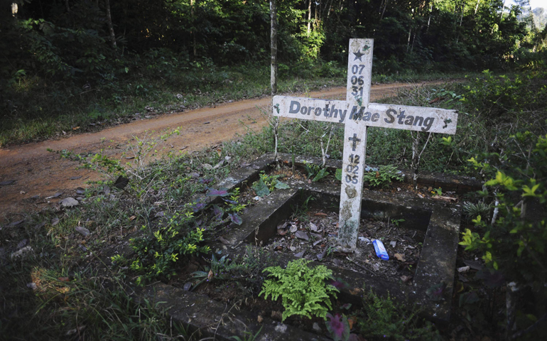 A cross stands on the spot where U.S. Sr. Dorothy Stang, a member of the Sisters of Notre Dame de Namur, was murdered Feb. 12, 2005, on an isolated road near the Brazilian town of Anapu. (CNS/Reuters/Lunae Parracho)