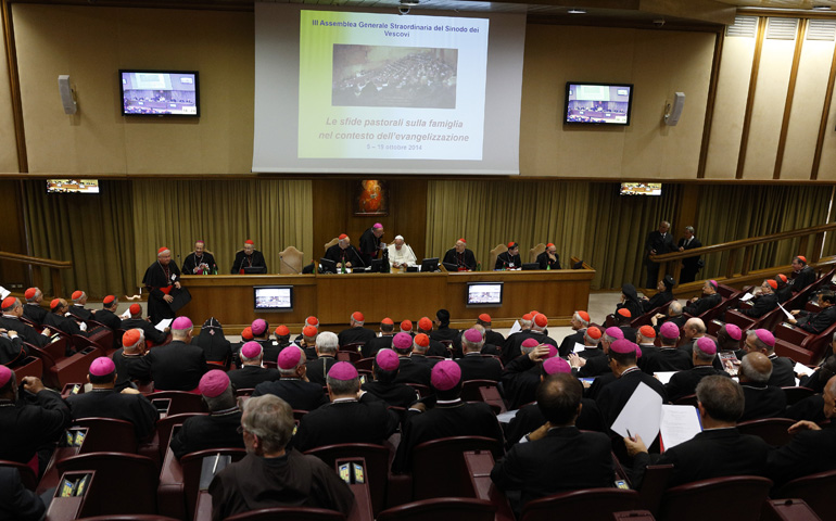 Pope Francis leads the afternoon session on the first working day of the extraordinary Synod of Bishops on the family Monday at the Vatican. (CNS/Paul Haring) 