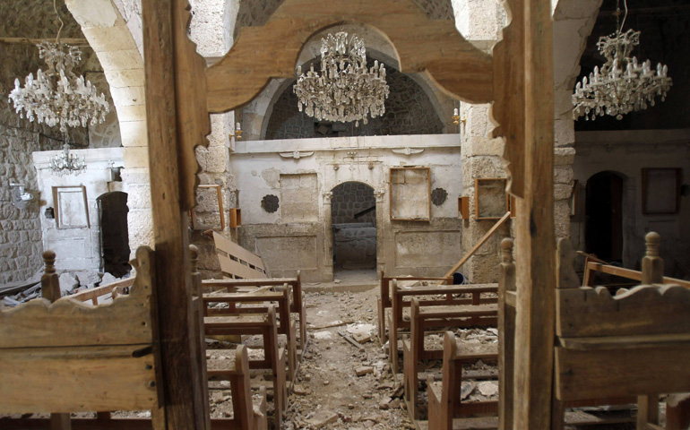 A badly damaged church in the Monastery of Mar Sarkis in the ancient Christian town of Maaloula, Syria (CNS/Reuters/Khaled al-Hariri)