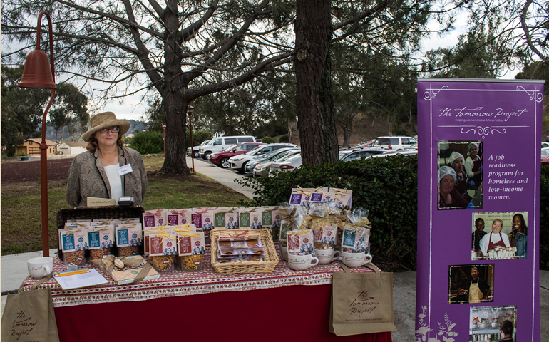 Participants can be seen selling their products at various community events.