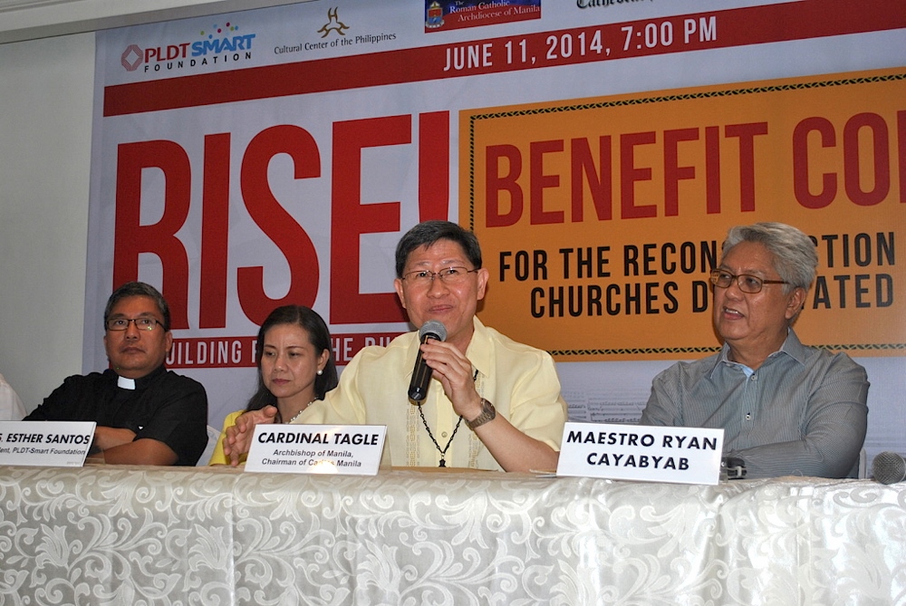 Caritas Manila Chairman Cardinal Luis Tagle of Manila and Executive Director Fr. Anton Pascual (left) with renowned composer-musician and papal awardee Ryan Cayabyab and Esther Santos, President of PLDT-Smart Foundation present "RISE! Rebuild from the Ruins" benefit concert they organized to support Caritas Manila's rehabilitation of churches and chapels destroyed by Haiyan in Samar and Leyte provinces. (N.J. Viehland)