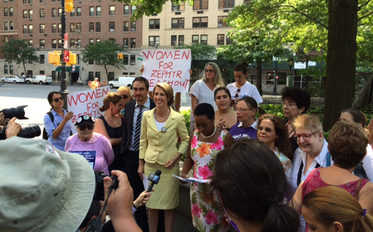Zephyr Teachout, in yellow, accepts the endorsement of the National Organization for Women on Aug. 26 at Riverside Park in Manhattan, N.Y. (Ben Feuerherd)  