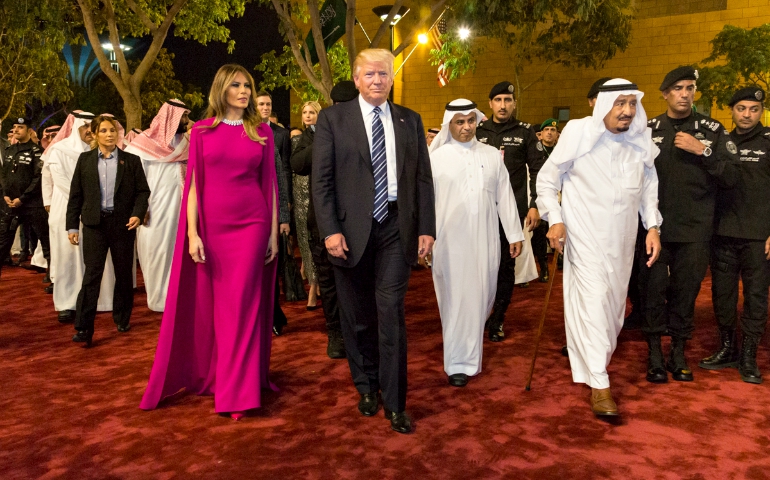 King Salman bin Abdulaziz Al Saud escorts President Donald Trump and first lady Melania to a royal banquet at the Al Murabba Palace in Riyadh, Saudi Arabia, May 21. (White House/Shealah Craighead)