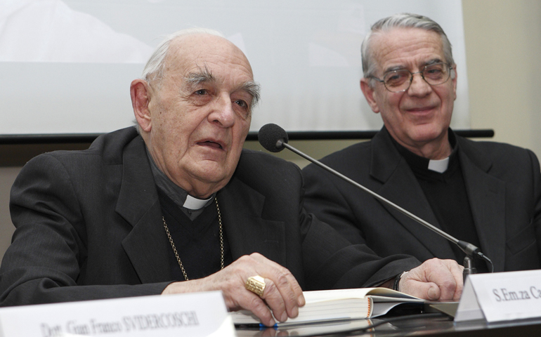 Retired Cardinal Roberto Tucci, left, and Vatican spokesman Jesuit Fr. Federico Lombardi at a 2011 Vatican press conference (CNS/Paul Haring)