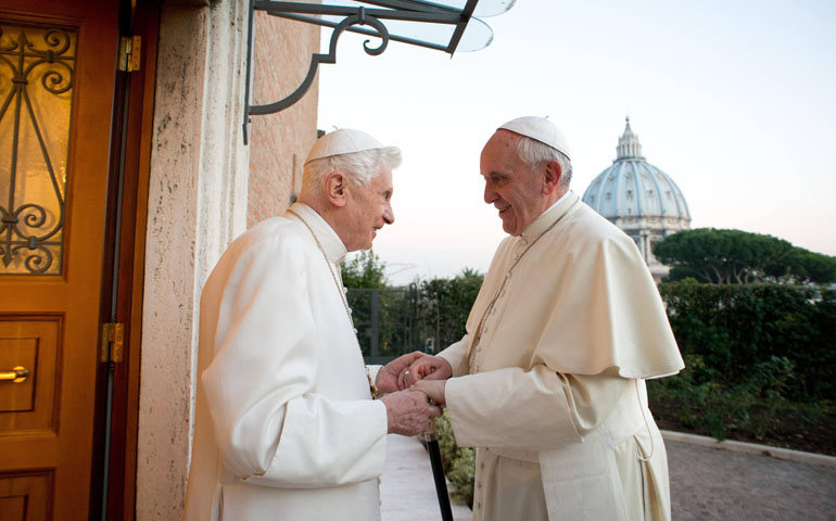 Retired Pope Benedict XVI greets Pope Francis on Dec. 23 at the Mater Ecclesiae monastery at the Vatican. (CNS/Reuters/L'Osservatore Romano)