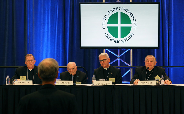 From left: Bishop John Wester of Salt Lake City; Cardinal Theodore McCarrick, retired archbishop of Washington; Archbishop Paul Coakley of Oklahoma City; and Miami Archbishop Thomas Wenski answer questions Tuesday during a news conference at the annual fall general assembly of the U.S. Conference of Catholic Bishops in Baltimore. (CNS/Bob Roller)