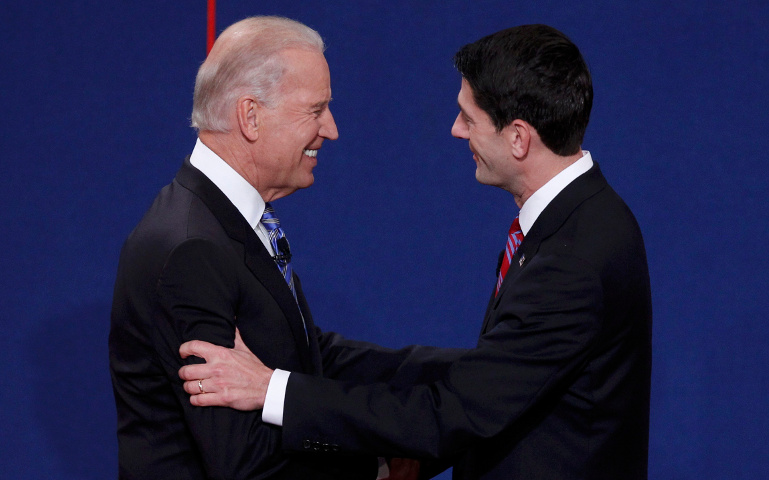 U.S. Vice President Joe Biden and Republican vice presidential nominee Paul Ryan shake hands Thursday before the U.S. vice presidential debate in Danville, Ky. (CNS/Reuters/Jeff Haynes)