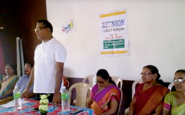 A screen capture from a YouTube video shows Fr. Robin Vadakkumcherry, standing, at an event in Kottiyoor, India, in January. (YouTube/Anil Nair)