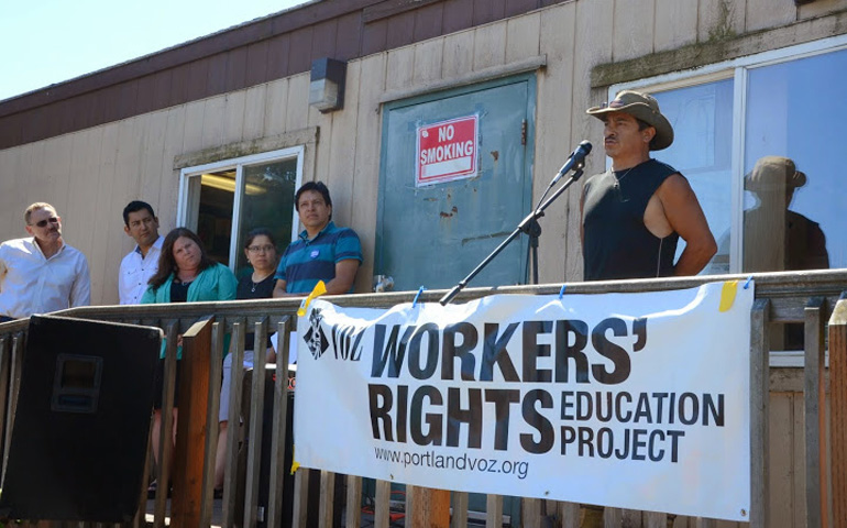 Luis Chacon, a board member for Voz Workers' Rights Education Project and its day labor president, speaks at a news conference Wednesday in Portland, Ore. (Douglas Yarrow)