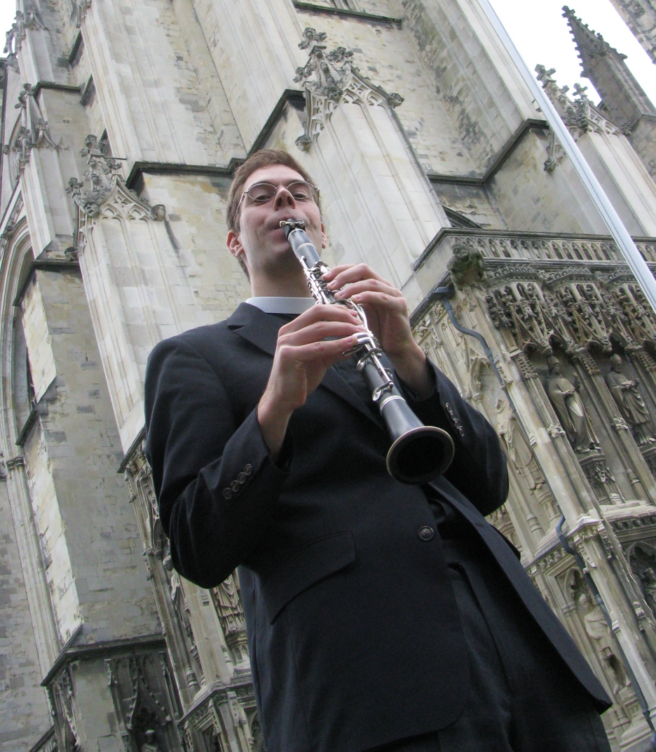 Andy Barnett, founder and band leader of the Theodicy Jazz Collective, warms up in front of Canterbury Cathedral in England. (David Chevan)