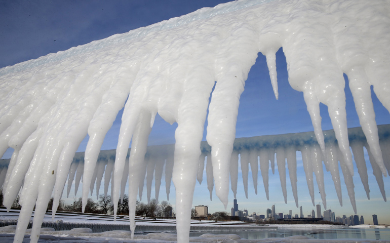 The Chicago skyline is framed by icicles Jan. 8. (CNS/Reuters/Jim Young) 
