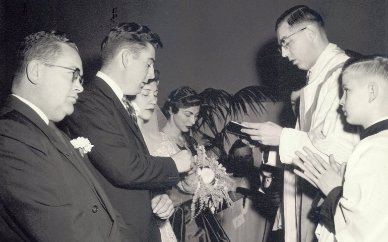 Jerry and Peg Mitten's wedding in 1955, with Fr. Allan Nilles