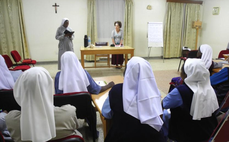 Global Sisters Report correspondent Melanie Lidman leads a writing workshop in Kampala, Uganda, with sisters participating in a basic accounting course in October. (Sr. Germina Keneema)