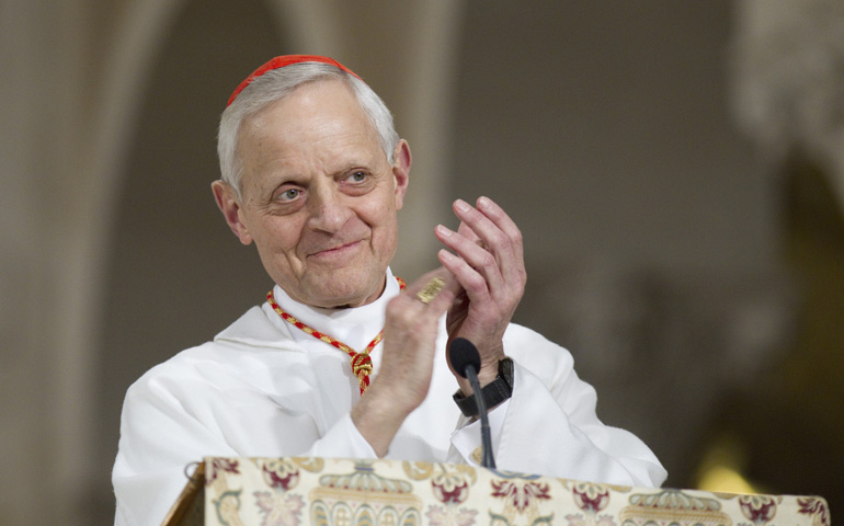 Washington Cardinal Donald Wuerl applauds after thanking young people for their dedication to pro-life causes at the start of the opening Mass of the National Prayer Vigil for Life at the Basilica of the National Shrine of the Immaculate Conception in Washington Jan. 24. (CNS/Nancy Phelan Wiechec)