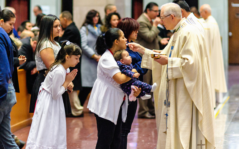 Catholics receive Communion during a Mass at the Cathedral of St. Joseph in Hartford, Conn., Jan. 18. (CNS/Bob Mullen)