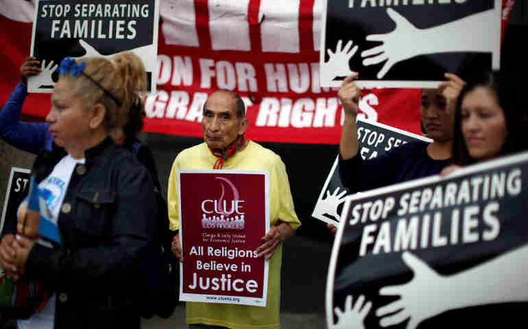 People protest May 17 in Los Angeles against plans to deport Central American asylum seekers. (CNS/Reuters) 
