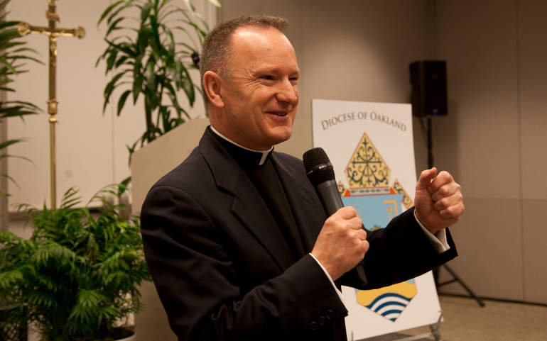 Bishop-elect Michael Barber gestures during a May 2 press conference in Oakland, Calif. (CNS/Cindy Chew)