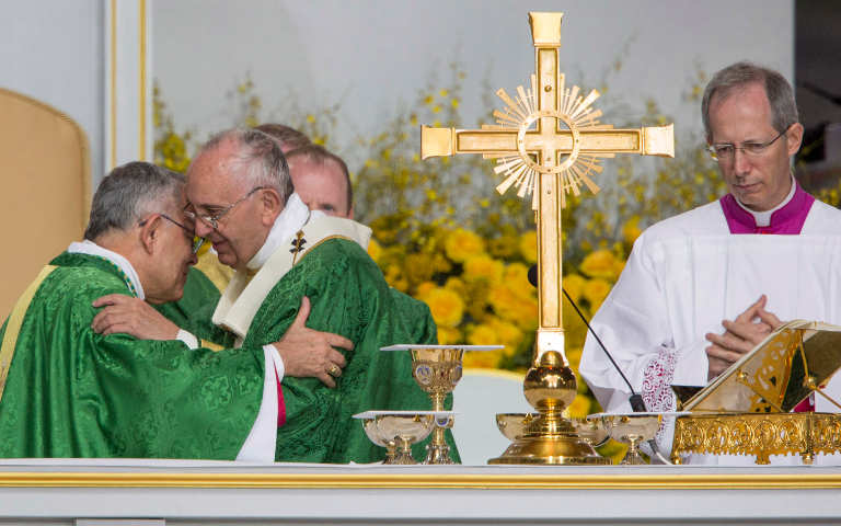 Pope Francis and Archbishop Charles Chaput at Mass for the World Meeting of Families in Philadelphia Sept. 27. (CNS/Rick Musacchio)