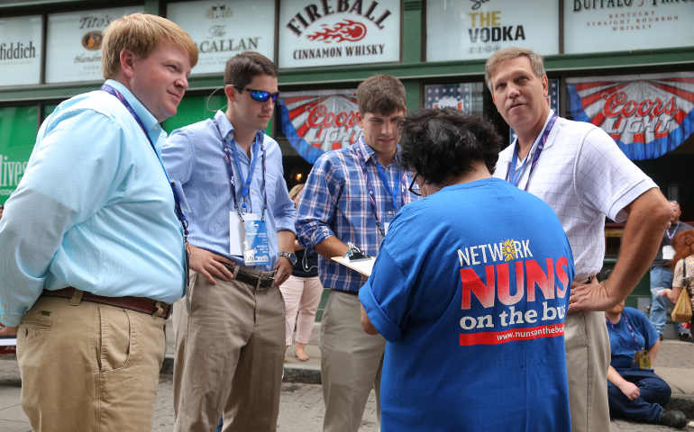 Sister of St. Agnes Clare Lawlor interviews people July 18 outside the Republican National Convention in Cleveland. (CNS/William Rieter)
