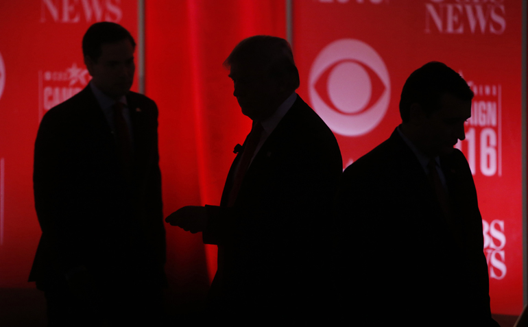 Senator Marco Rubio, businessman Donald Trump and Senator Ted Cruz walk the stage at the Republican U.S. presidential candidates debate in Greenville, South Carolina Feb. 13, 2016. (Reuters/Jonathan Ernst)