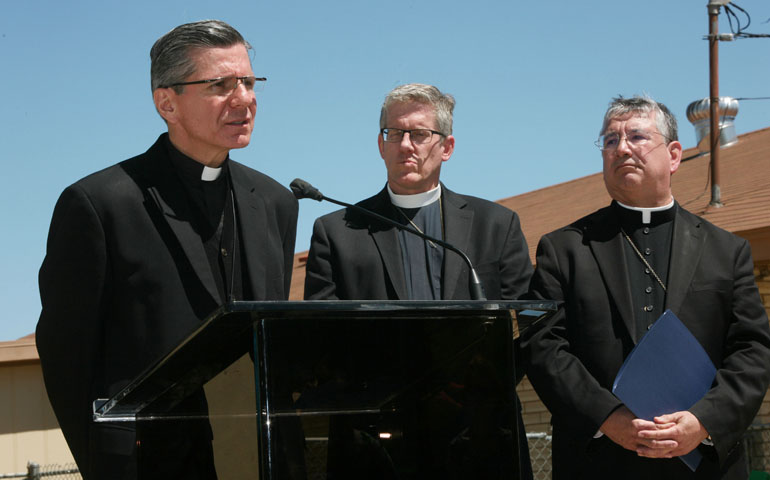 From left: Archbishop Gustavo Garcia-Siller of San Antonio, Bishop Michael Rinehart of the Texas-Louisiana Gulf Coast Synod in the Evangelical Lutheran Church in America, and Bishop James A. Tamayo of Laredo, Texas, at a press conference Friday at St. Joseph Catholic Church in Dilley, Texas (Nuri Vallbona)