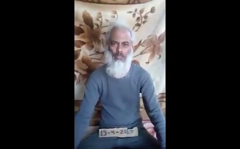 Indian Salesian Father Tom Uzhunnalil, who was kidnapped in Yemen more than a year ago, is seen in a screen grab from a YouTube video. (CNS)