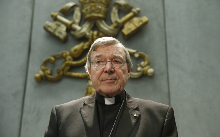 Australian Cardinal George Pell arrives to deliver a statement in the Vatican press office June 29 after Australian authorities filed sexual abuse charges against him. (CNS/Paul Haring)