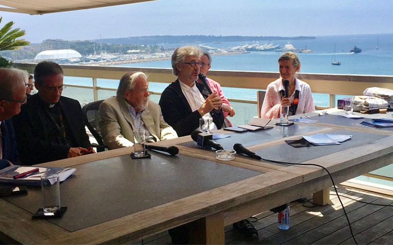 German director Wim Wenders, center, speaks during a panel discussion on May 25, 2017, in Cannes, France. (RNS/A.J. Goldmann)