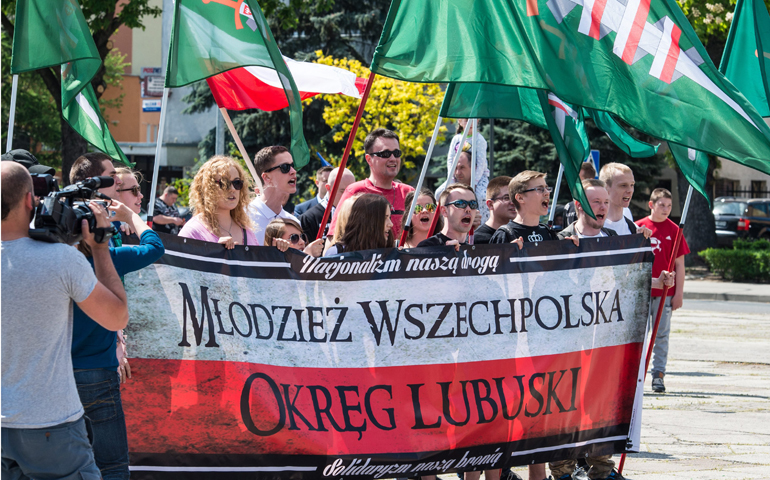 Members of the group All-Polish Youth demonstrate against refugees across the river from Frankfurt, Germany, in Slubice, Poland, May 7. (Newscom/EPS/Patrick Pleul)