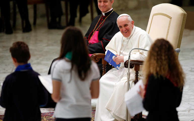 Pope Francis smiles during a special audience with students from Jesuit schools June 7 in Paul VI hall at the Vatican. (CNS/Max Rossi, Reuters)