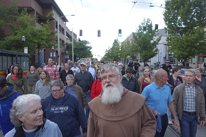 More than 500 persons took part in a June 15 candlelight prayer vigil and procession from Seattle's St. Mark's Episcopal Cathedral to St. James Catholic Cathedral. (Photo courtesy St. James Cathedral)