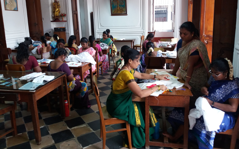 Women work on embroidery at the Cluny Embroidery Center in Puducherry, southern India. (Philip Mathew)