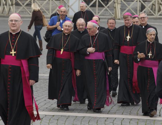 U.S. bishops on their ad limina visits to the Vatican walk across St. Peter's Square Nov. 4. (CNS/Paul Haring)