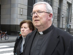 Msgr. William Lynn walks away from the courthouse after a hearing in Philadelphia March 14, 2011. (CNS/Reuters/Tim Shaffer)