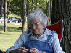 Anne-Marie Gallagher quietly makes rosaries at home.