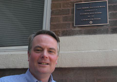 Tom Seeberg stands in front the Lizzy Seeberg Volunteer House in Chicago. (Kaitlin Kimont)