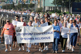 Members of the Leadership Conference of Women Religious march through Woldenberg Riverside Park in New Orleans for a prayer service to preserve the wetlands. The walk was part of the conference's 2009 annual gathering. (CNS/Clarion Herald/Frank J. Methe)