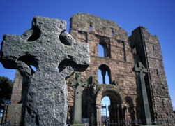 The ruined Benedictine priory helps pilgrims imagine a community of early ardent Christians. (Newscom/ZUMA Press)