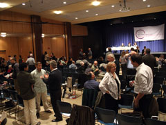 Audience members talk during a break at the "Learning to Listen: Voices of Sexual Diversity and the Catholic Church" conference at Fordham University in New York Sept. 16. (Alice Popovici)