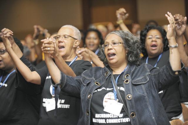 Attendees at the National Black Catholic Congress XI sing July 19 during the gathering in Indianapolis. (CNS/Bayou Catholic/Lawrence Chatagnier)