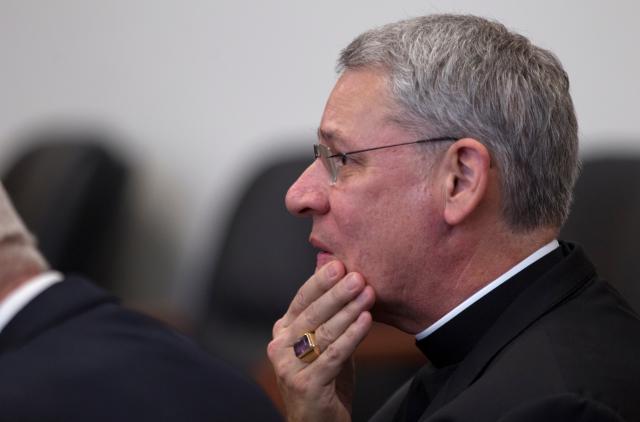 Kansas City-St. Joseph, Mo., Bishop Robert Finn is seen in Jackson County, Mo., Circuit Court on Sept. 6. (The Kansas City Star, pool/Tammy Ljungblad)