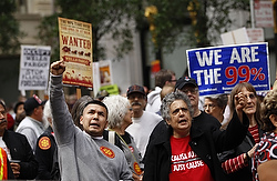 Demonstrators protest outside of the Wells Fargo shareholders meeting in the financial district in San Francisco on April 24, calling for bank officials to be more responsive to homeowners facing foreclosure. (CNS/Reuters/Robert Galbraith)