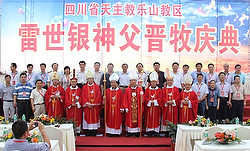 Bishop Paul Lei Shiyin, holding crosier on right, poses with other clergymen after being ordained bishop of Leshan, China, Jun 29. Bishop Lei was ordained without a papal mandate at Our Lady of the Rosary Church in Emeishan, reported the Asian church new s agency UCA News. (CNS photo/courtesy Diocese of Leshan, UCAN)