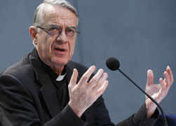 Jesuit Father Federico Lombardi speaks at a March 20 briefing . (CNS photo/Paul Haring)