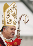 Bishop Bernard Fellay, superior of the Society of St. Pius X, addresses the crowd before a 2009 ordination ceremony in Econe, Switzerland. (CNS photo/Denis Balibouse, Reuters)