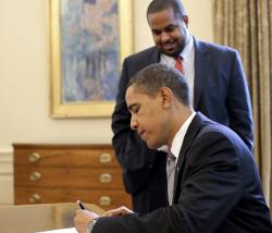 Joshua DuBois in the Oval Office at the White House with President Obama. (CNS)