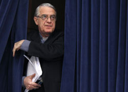Jesuit Father Federico Lombardi, the Vatican spokesman, arrives at the Vatican April 13 for a news conference about Pope Benedict XVI's visit to Malta. (CNS photo/Alessandro Bianchi, Reuters)